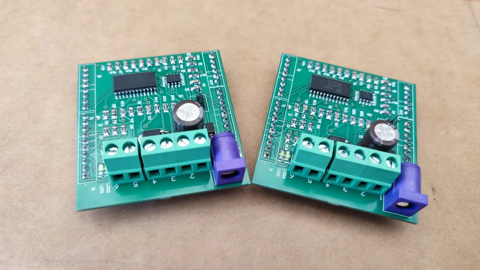 Engineer testing a custom electronic prototype and PCB design